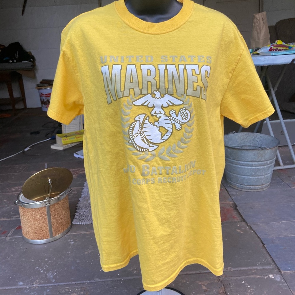 Yellow U.S. Marines tee.